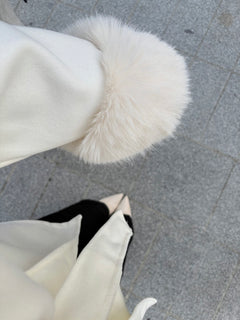 Manteau Nouama à ceinture et fourrure aux manches